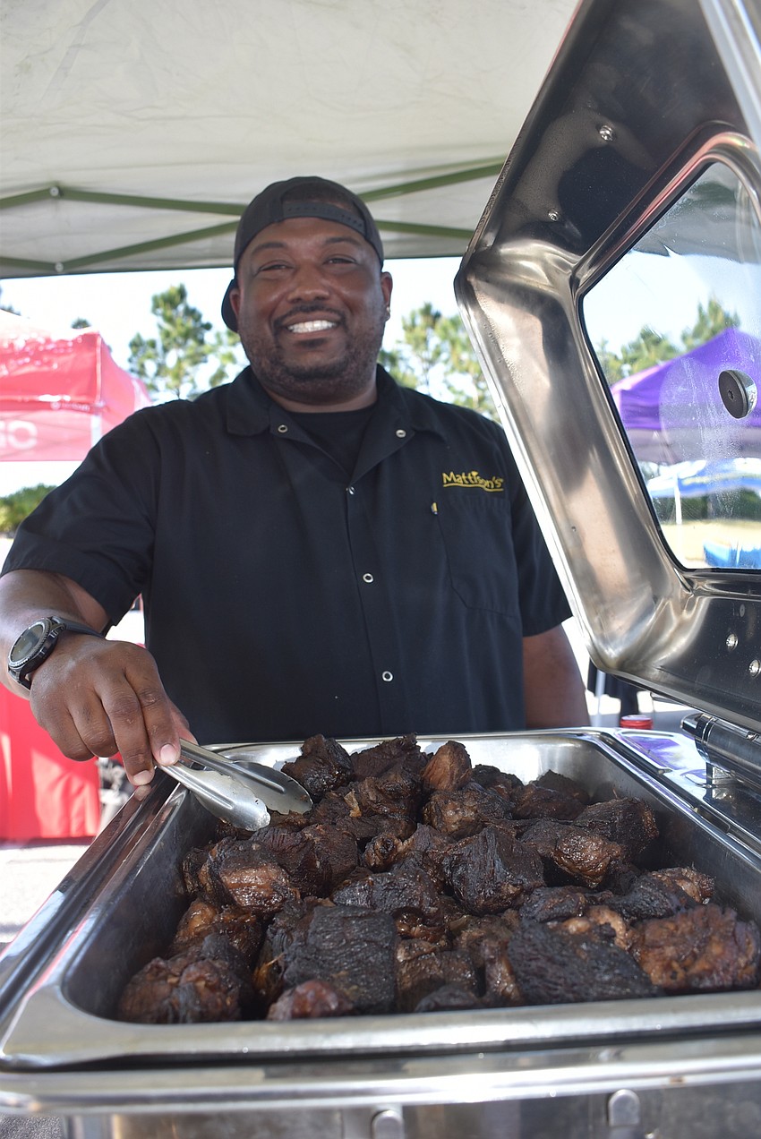 Mattison's City Grille Chef Garrett Pristley tends to the braised short rib, which was one of the most popular dishes at the entire trade show.