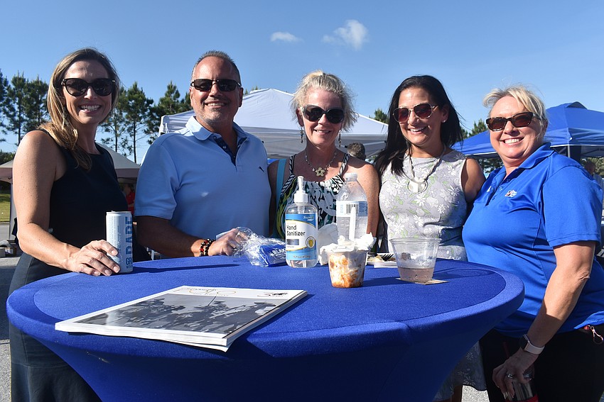 Sarasota Magazine's Allison Kummery, Current Technologies President Steve Daugherty, his wife, Liz Daugherty, Current Technologies Vice President of Business Development Michelle Olivo and First Citizens Bank's Lisa Lawler.