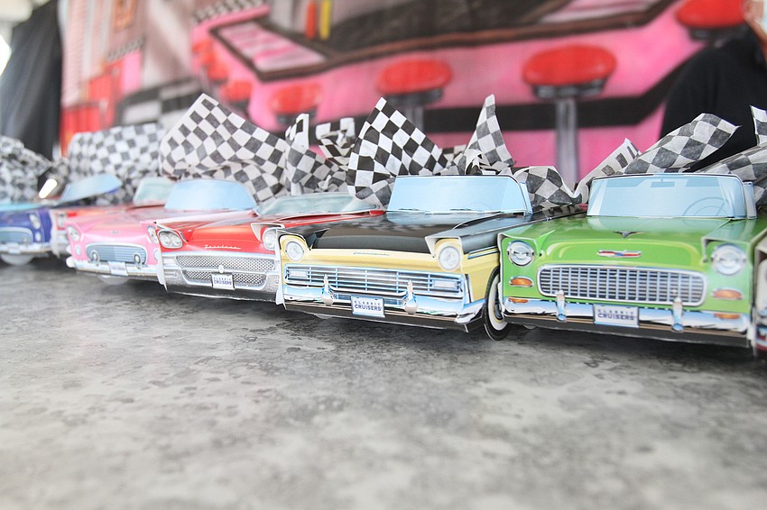 Car models lined the countertops at the tent restaurant.