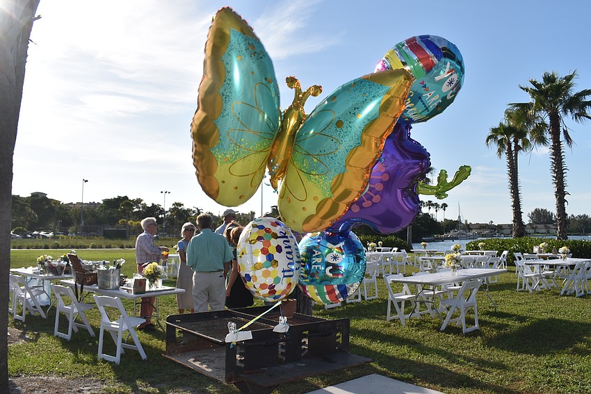 Garden-themed balloons waved over the party.