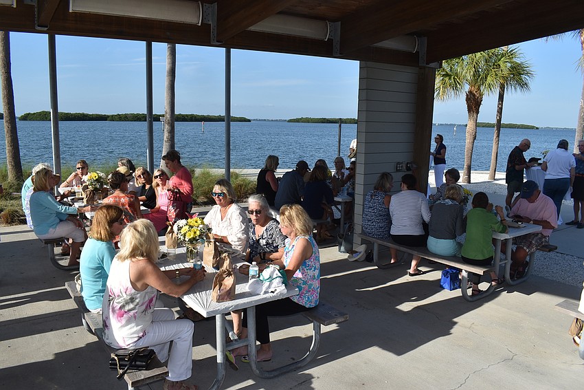 Attendees found spots at the tables under the Bayfront Park pavilion.