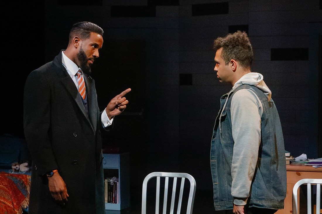 Xavier (Joel P.E. King) and his son, Omari (Donovan Whitney) talk after Omari&#39;s altercation with a teacher. Photo by Sorcha Augustine
