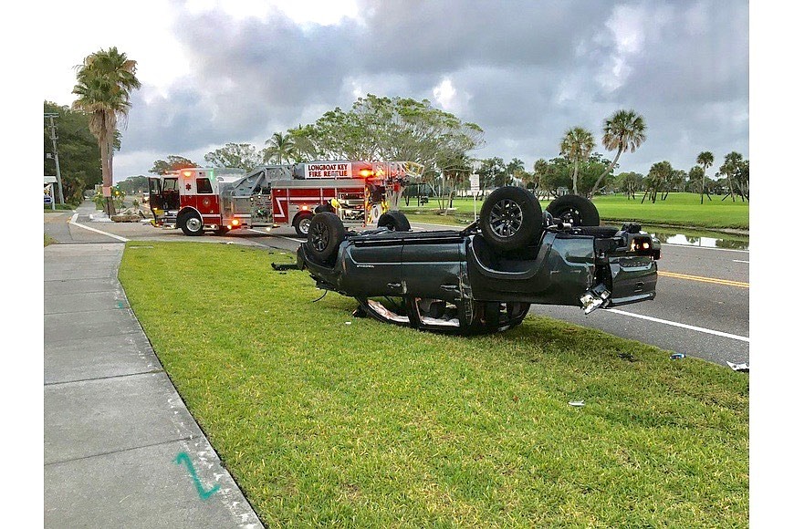 The rollover crash happened at about 6:30 a.m. Thursday near the Mobil gas station on Gulf of Mexico Drive. Photo courtesy of the town of Longboat Key.