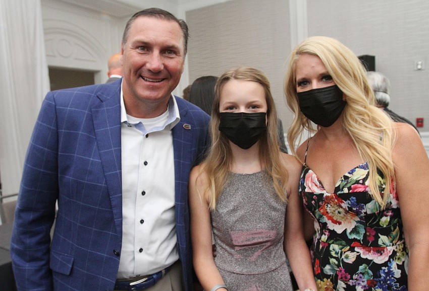 Honoree Dan Mullen with Dallas residents Sadie and Sarah Keller