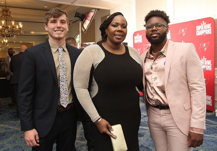 Clearwater resident Steven Hieneman with Tampa residents Lashina Lewis and N'Jhari Jackson