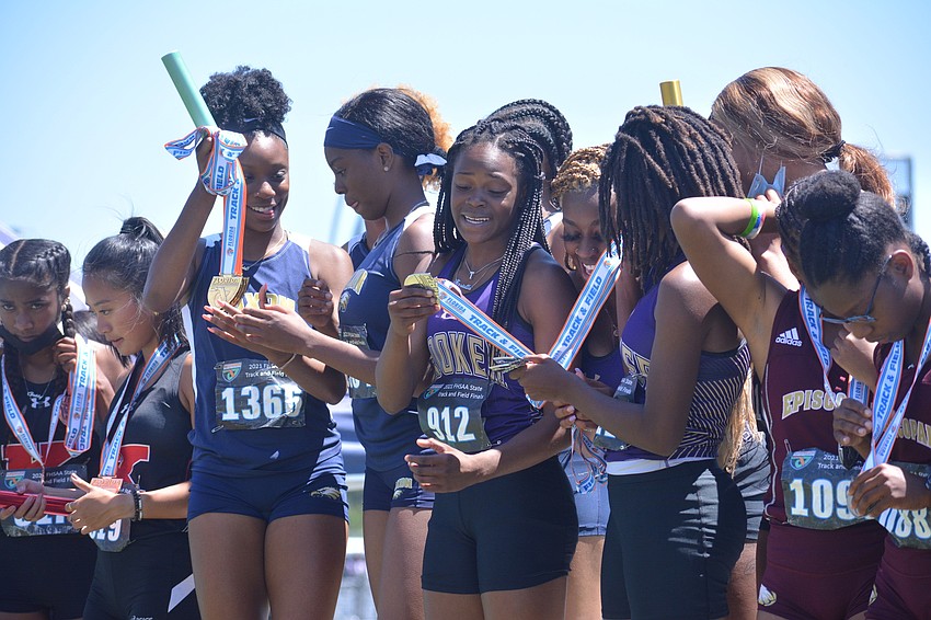The Booker High girls 4x400 relay team (senior 	 Dominique Starr, freshman Jakai Peterson, senior Raja Arrington and freshman Terrietta Smith) took silver in the Class 2A event (49.40 seconds).