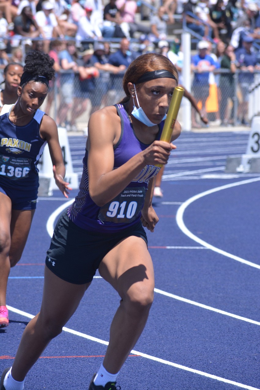 Booker senior Dominique Starr ran the first leg of the school's Class 2A 4x400 relay race. The Tornadoes would finish second (49.40 seconds).