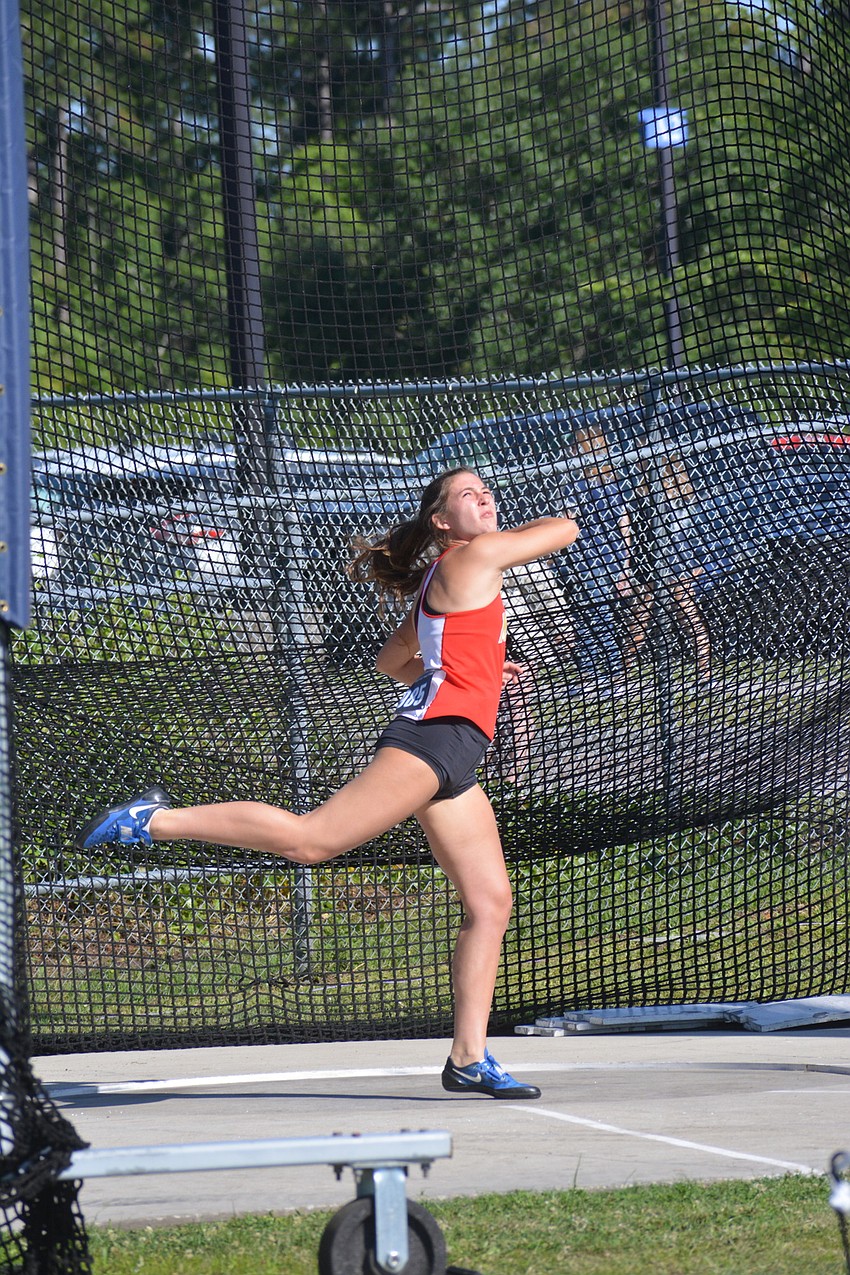 Cardinal Mooney High sophomore Madeline Carson tosses the discus at the Class 2A championships. Carson would finish 10th (108 feet, four inches) in the girls event.