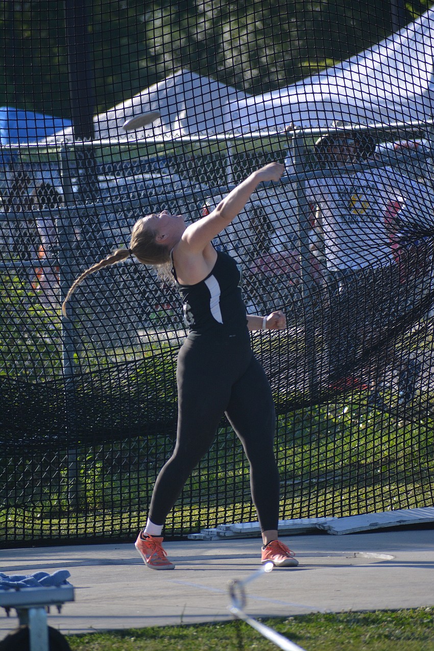 Lakewood Ranch senior Riley Simmons spins and lets go of her discus ring. She would finish second in the Class 4A event  (142 feet, eight inches).
