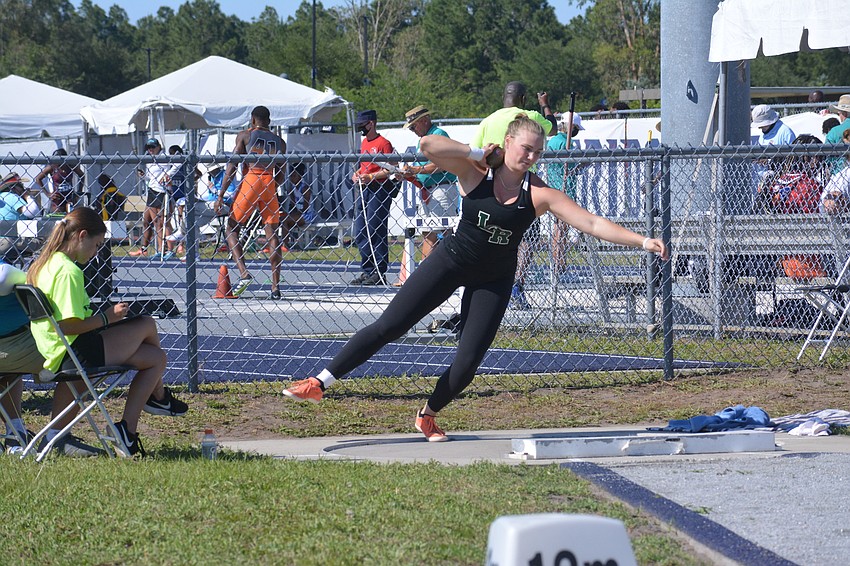 Lakewood Ranch senior Riley Simmons fires off her shot put attempt. SImmons would win the Class 4A event (44 feet, 3.25 inches).