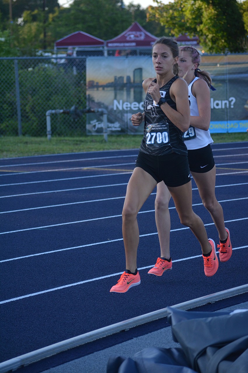 Lakewood Ranch junior Grace Marston overtakes an opponent in the Class 4A girls 3,200 meter run. Marston would finish sixth (10:53.23).