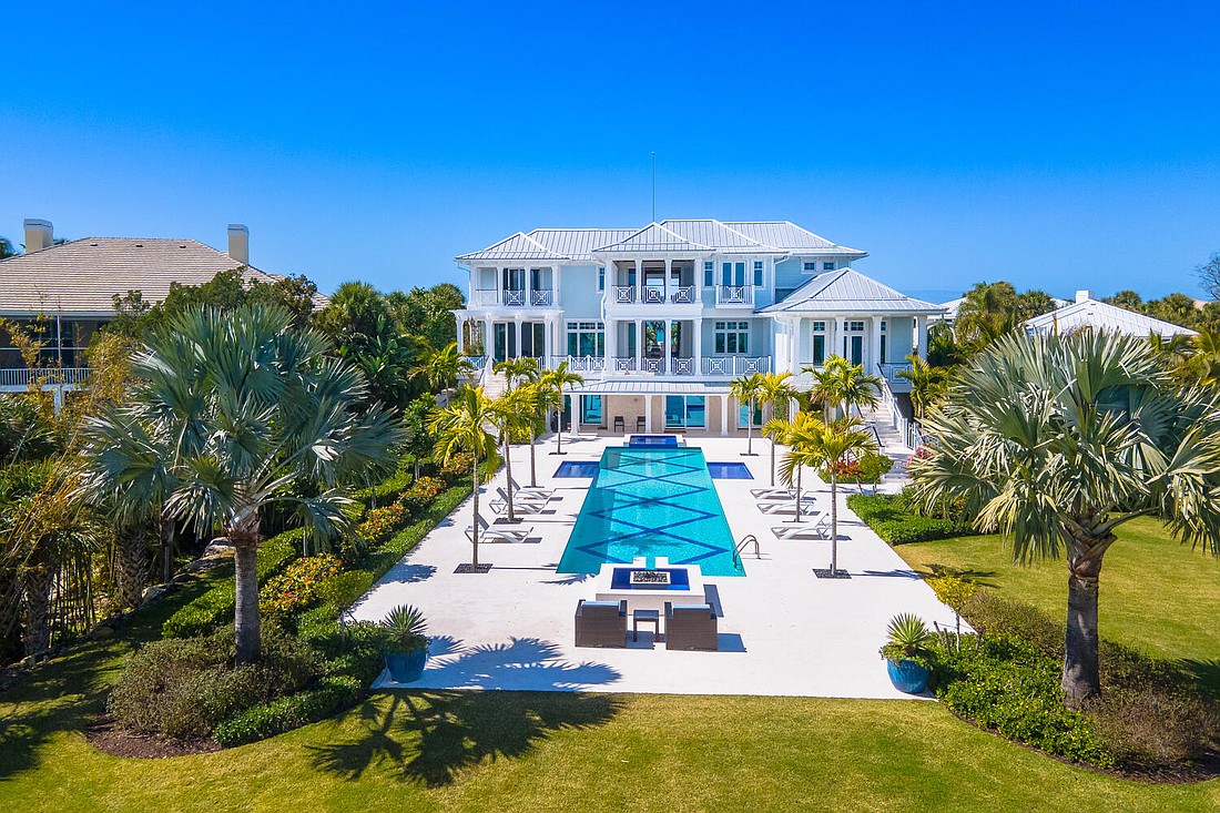 The main house at 1900 Casey Key Road built in 2018 and has five bedrooms, five-and-a-half baths, a pool and 7,439 square feet of living area.