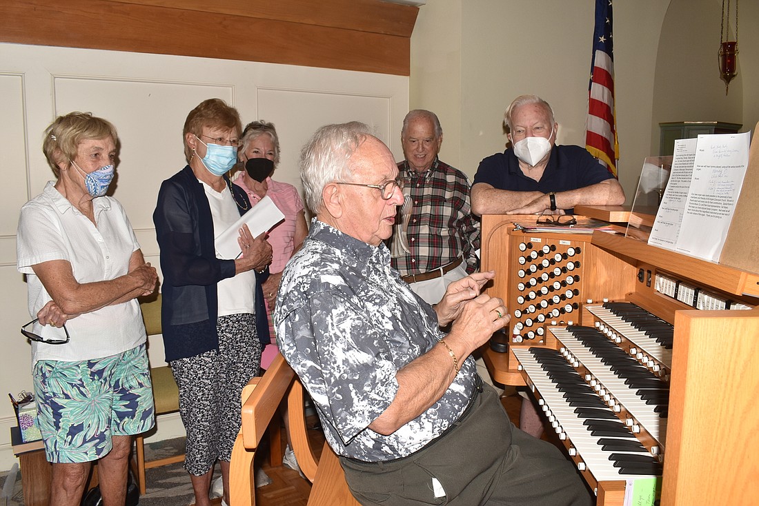 Dale Hooey showcased the organ to church members.