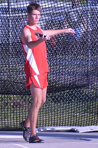 Cardinal Mooney senior Max Middleton stares down his spot before a throw in the 2A boys discus. Middleton would finish second.