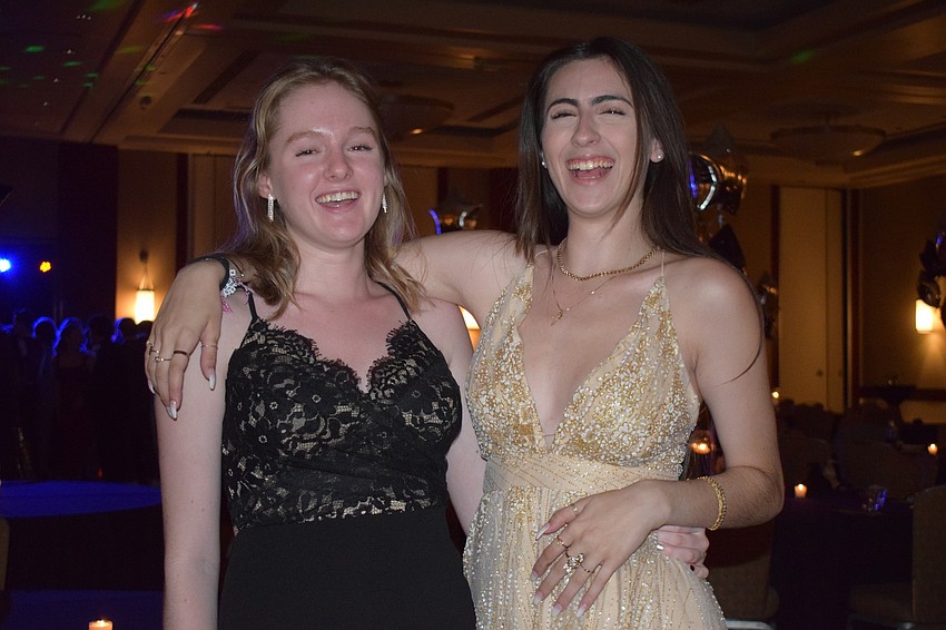 Seniors Stacey Balloch and Gina Miceli have fun at their prom. 