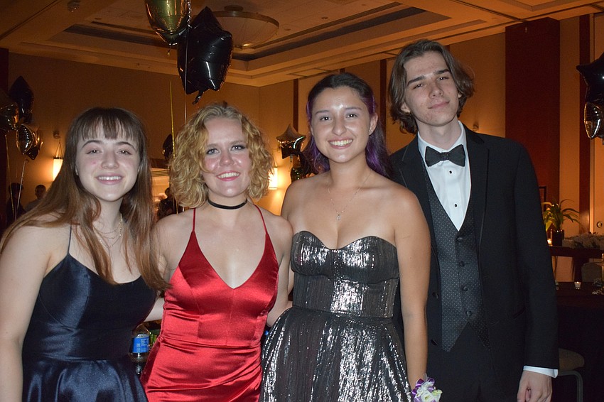 Faith Moore, a student at the State College of Florida and Lakewood Ranch High seniors Erika Lyvers, Meghan Llamas and Jackson Randolph are thrilled to be at prom. Llamas' mother organized the prom with Angie Lenchinsky Scarpa.