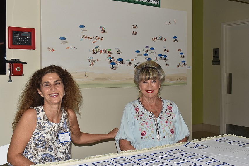 Melissa Afstralou and Joanne Forch greeted guests and gave out name tags.