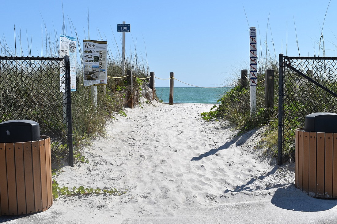 The town is planning to make improvements to the west end of the North Shore Road beach entrance. Town leadersr will evaluate what to do with the chainlink fence on the north side of the entrance.