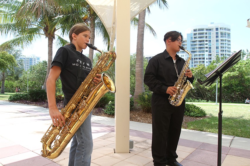 Eighth-graders Taltos Fuszfas and Angel Guzman play saxophones together.