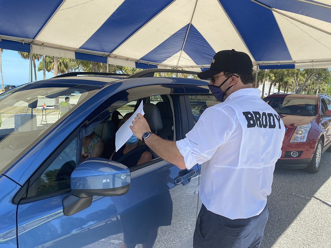 In addition to featuring volunteers, a photo posted to the cityâ€™s Twitter account on March 27 showed Mayor Hagen Brody at a Van Wezel vaccination event. Image via city of Sarasota.