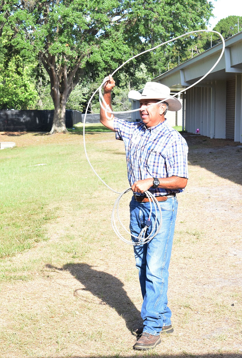 Brian Broxson with Blackbeard's Ranch demonstrates how to use a lasso.