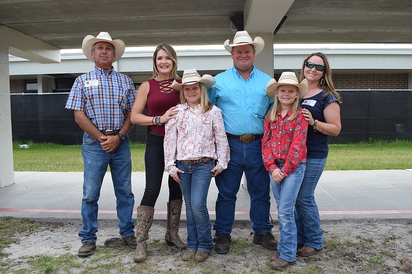 Brian Brioxson with Blackbeard's Ranch, shows Ellie Dauphas', a fourth grade teacher at Gene Witt Elementary School, class about ranch life with Cady Jones, Brian Jones, Cooper Jones and Cassidy Jones.