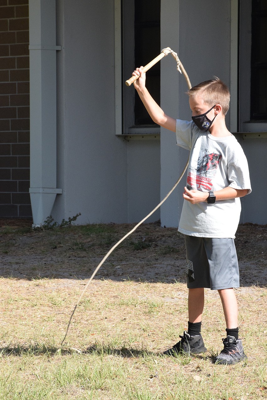 Pierson Holt, a fourth grader, is close to getting his whip to make a pop noise.
