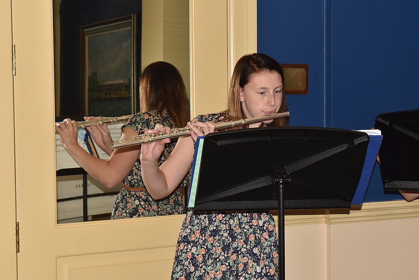 Ann Verhagen accompanied composition winner Katherine Arico on her flute piece, 