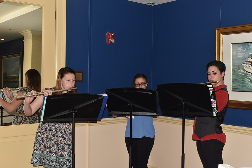 Ann Verhagen, Katherine Arico and Halle Cooper perform 