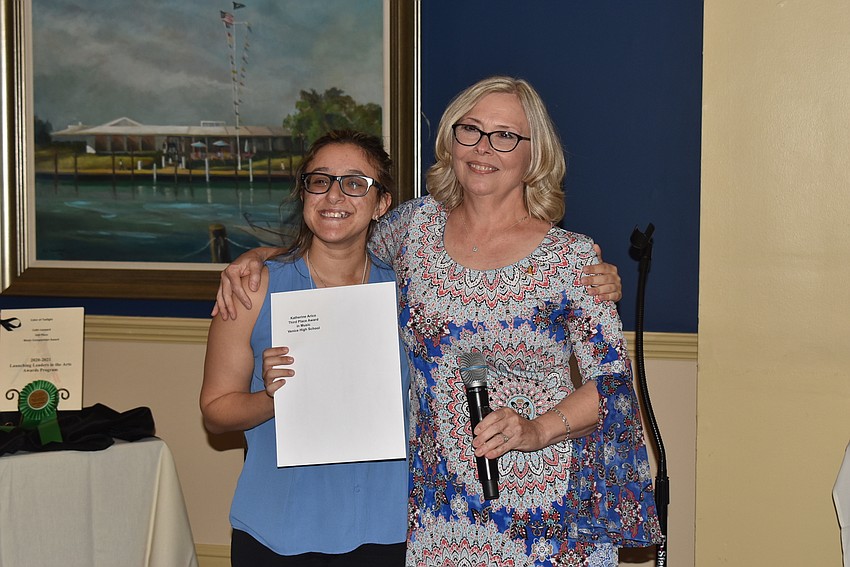 Katherine Arico accepted her award from Jan Schaberg.