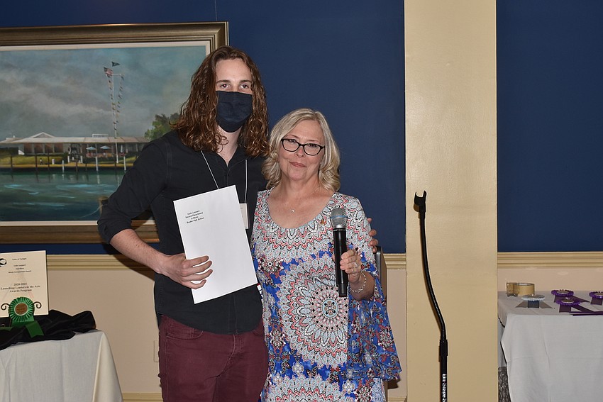 Colin Leonard accepted his award from Jan Schaberg.