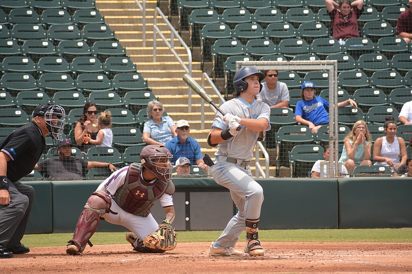 ODA junior Carter Dierdorf slugs a hit to the outfield. The hit would score senior Logan Tribble.