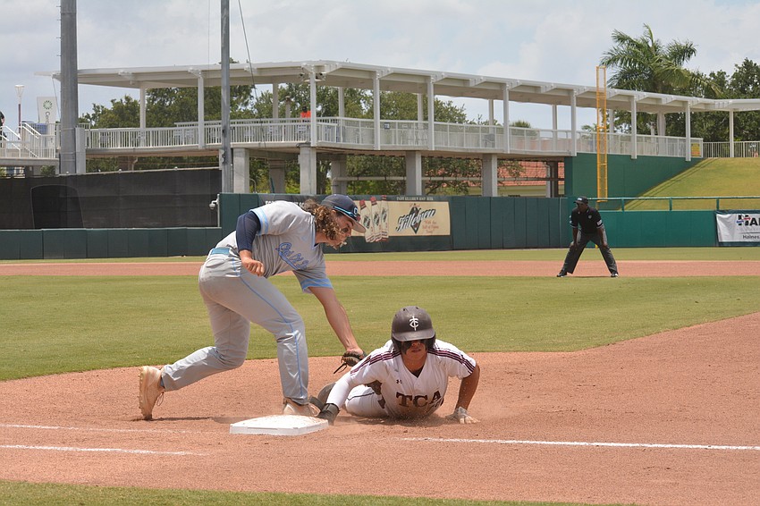 ODA senior Tyler Colditz catches a pickoff attempt at first base. The TCA runner was called safe.
