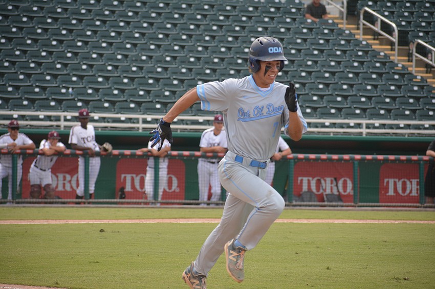 ODA senior Nolan Lewellen sprints to first base after laying down a bunt in the seventh inning. The bunt would score junior Aidan Marino to tie the game.