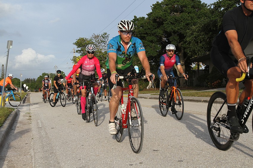 The Village Idiots cycling group assembled May 19, 2021, to raise awareness of cyclists' rights to public roadways.