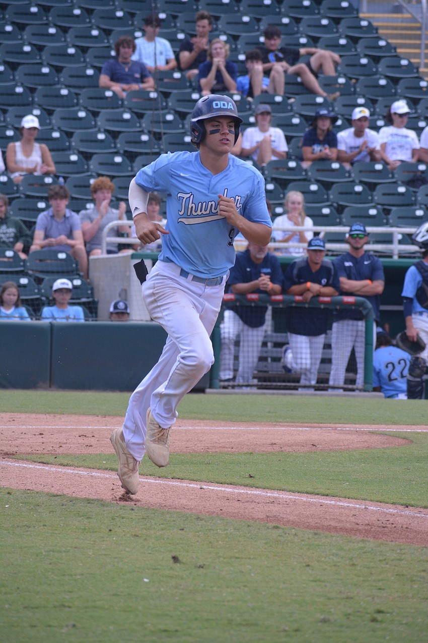 ODA senior Tanner Fairchild jogs to first base after being hit by a pitch.