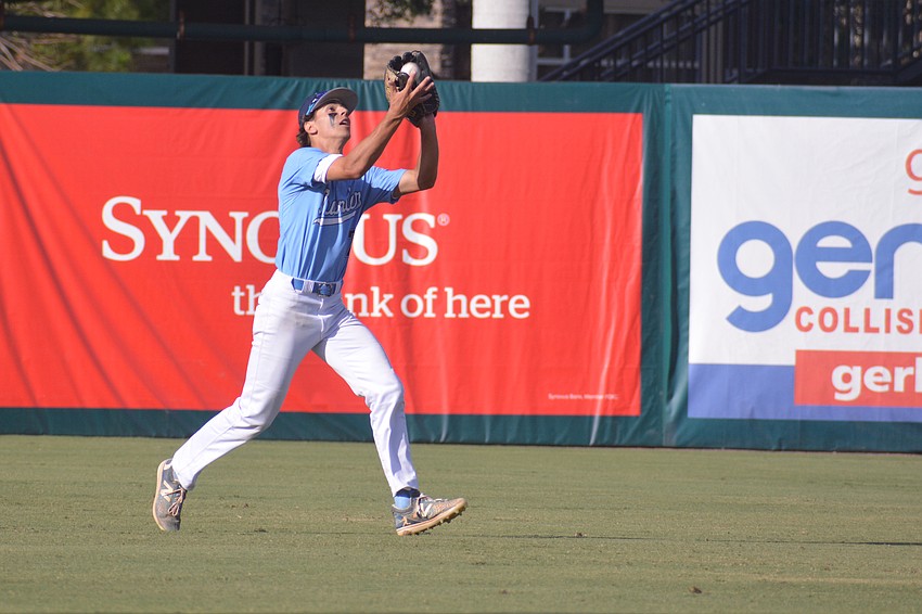ODA senior Nolan Lewellen catches a pop fly for the first out of the seventh inning.