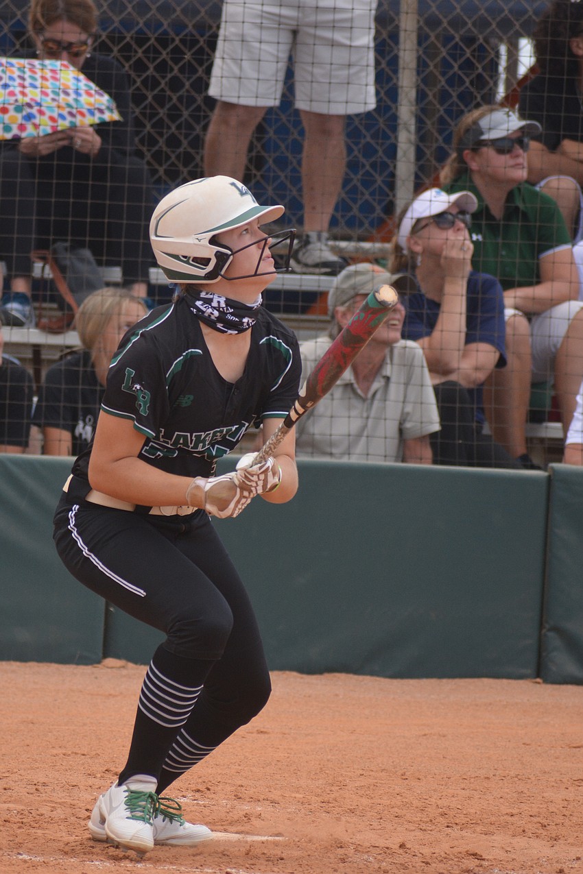 Lakewood Ranch sophomore Cassidy McLellan watches her second home run of the game soar out of the stadium.