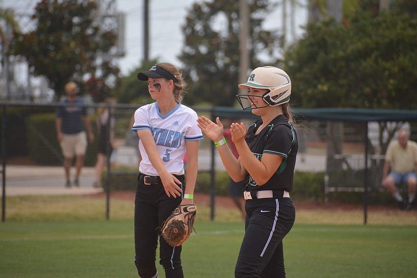Lakewood Ranch junior Taylor Shepherd claps at second base after hitting a double.