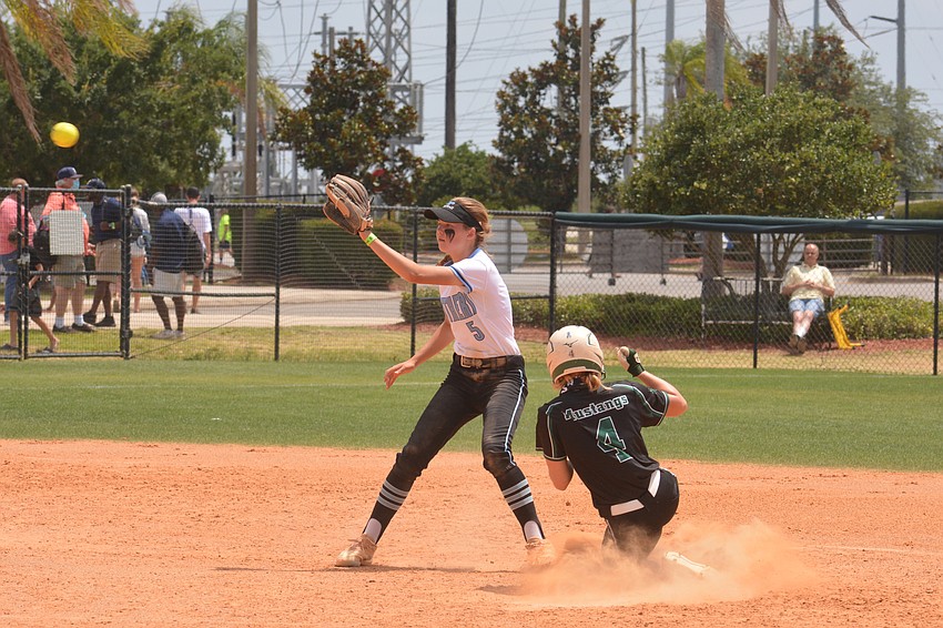 Lakewood Ranch junior Grace Hogie (4) slides into second base.