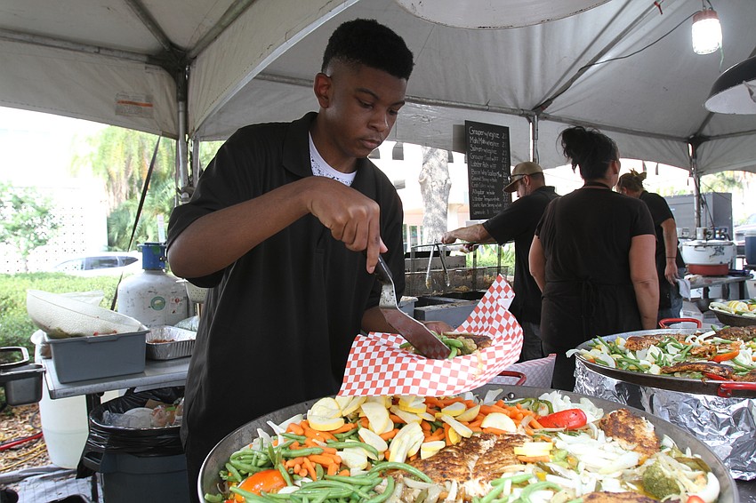 DJ Green serves up grouper.