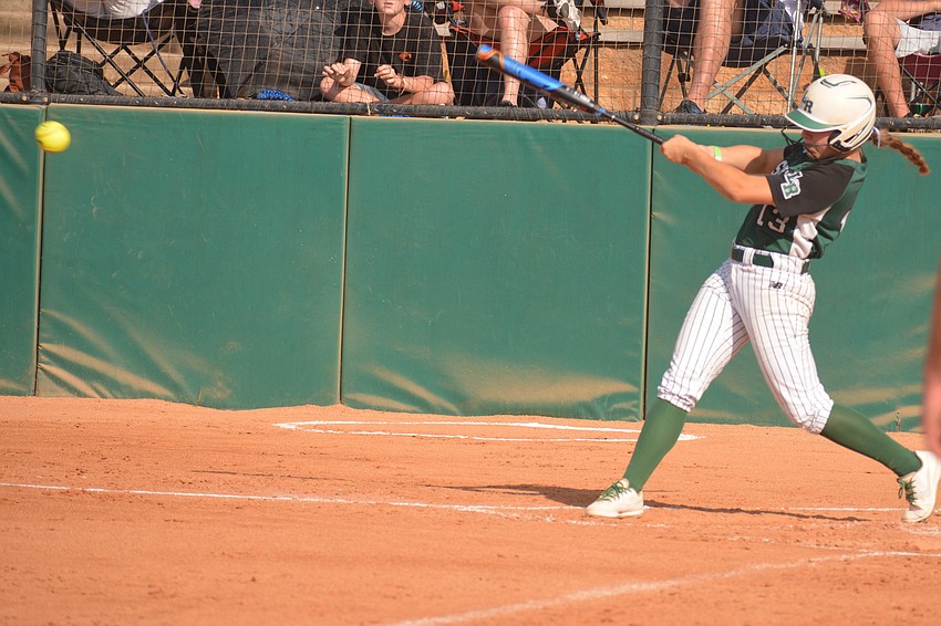 Lakewood Ranch junior Taylor Shepherd lines a base hit to right field.