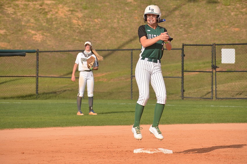 Lakewood Ranch freshman Grace Shaw-Rockey jumps for joy after hitting a double.