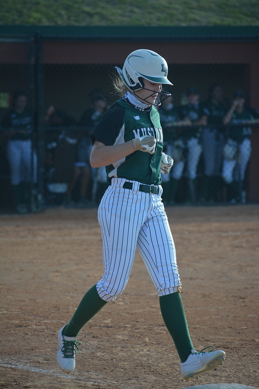 Lakewood Ranch sophomore Cassidy McLellan jogs to first base after a walk.