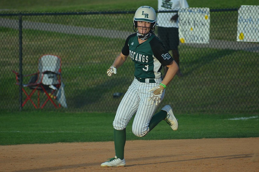 Lakewood Ranch sophomore Cassidy McLellan turns toward third base on her first triple of the sixth inning. She would end the game on a second, three RBI triple later in the inning.