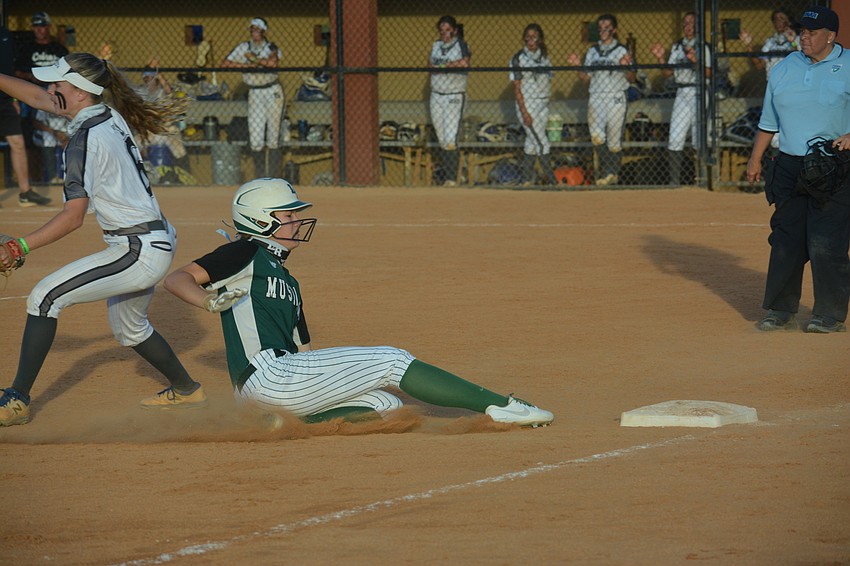 Lakewood Ranch sophomore Cassidy McLellan slides into third base.