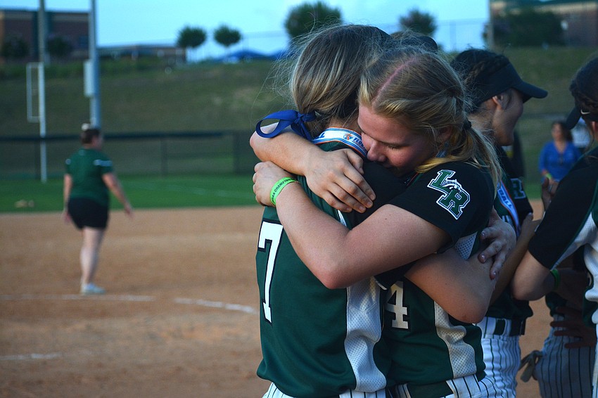 Lakewood Ranch freshman Grace Shaw-Rockey hugs junior Grace Hogie after the state championship win.