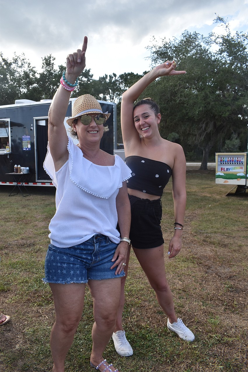 Riverwalk's Cherri Kessler and Hannah Degenaro sway to the song 