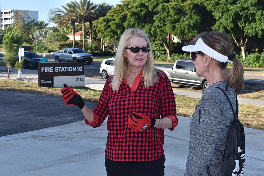 Susan Phillips and Linda Gidel game-plan the morning.