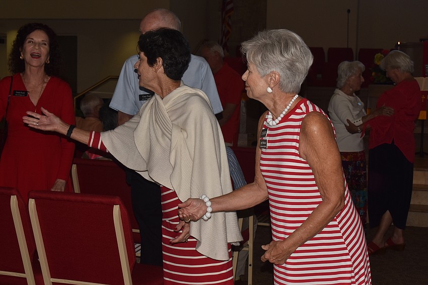 Ushers at CCLBK released church one row at a time.